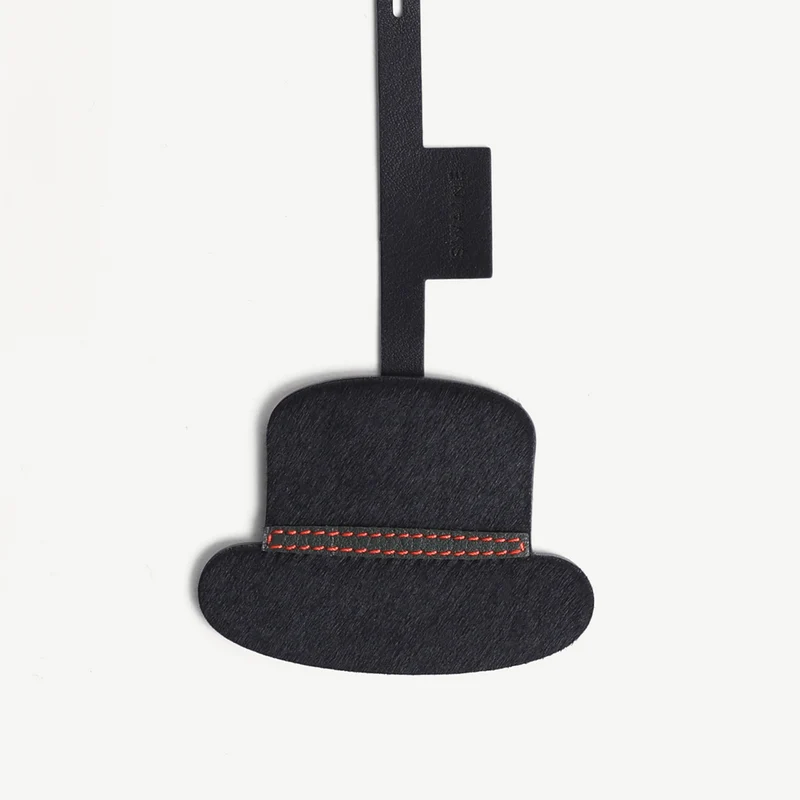 Breloque pour chapeau melon