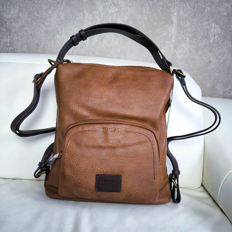 Tampa sac à main convertible en sac à dos