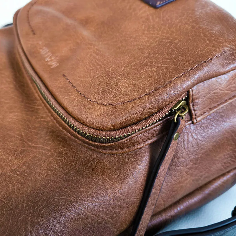 Tampa sac à main convertible en sac à dos