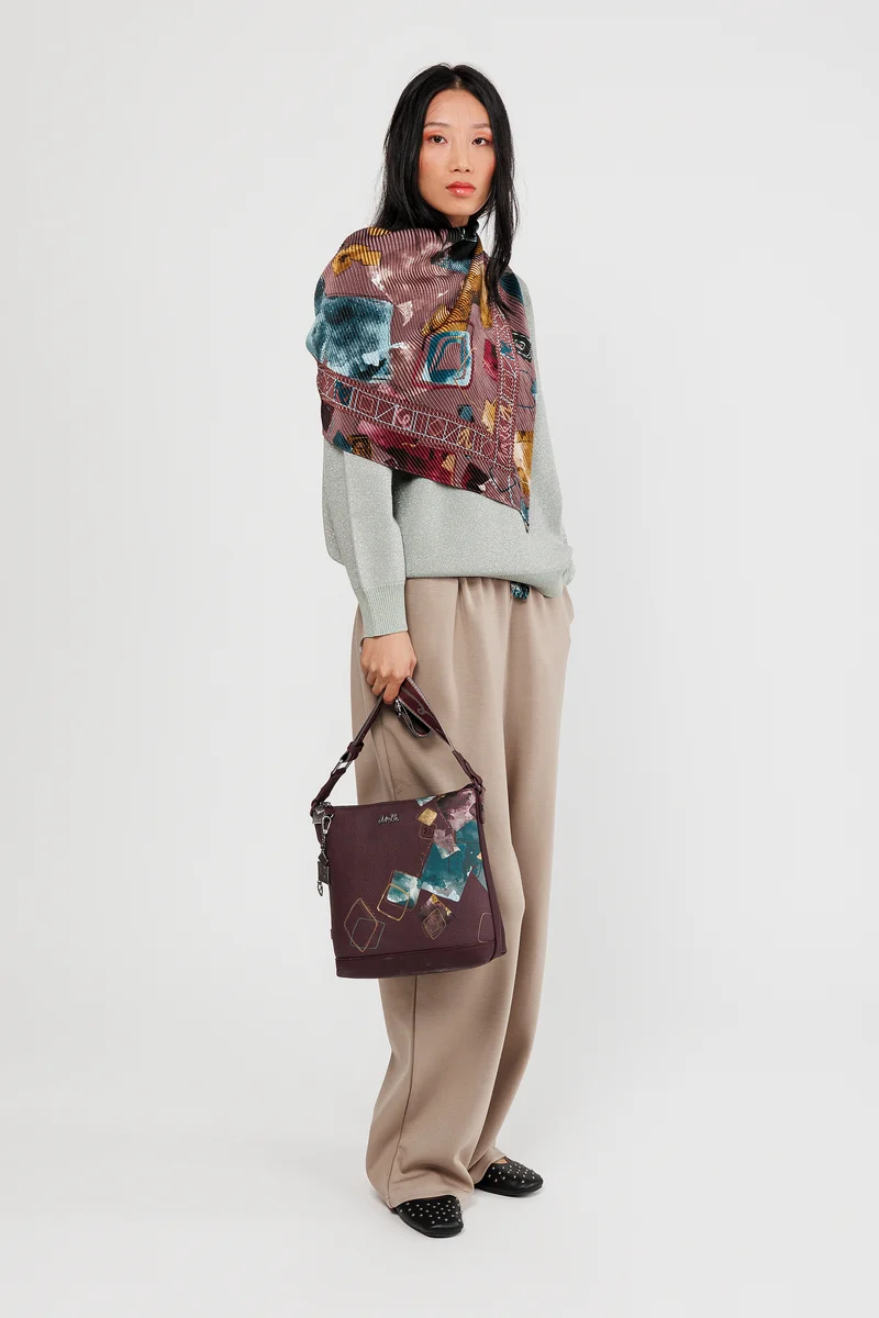 Sac bandoulière moyen Evolution