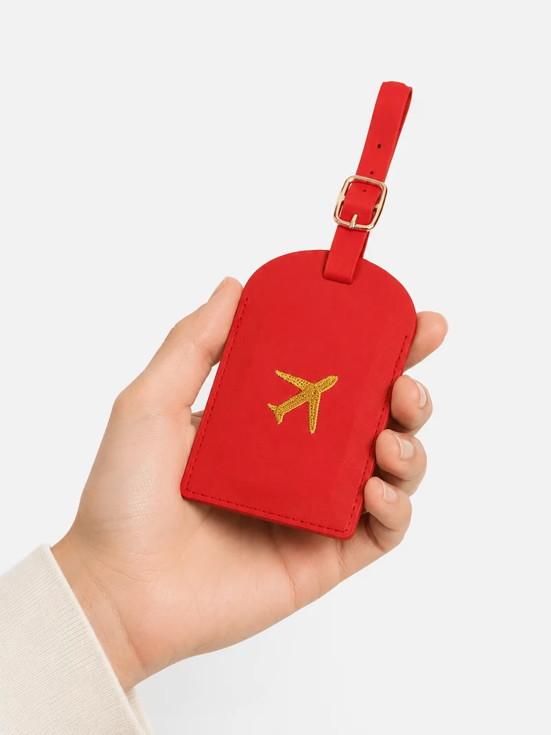 Étiquette de bagage en cuir motif avion avec porte-adresse